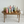 Miniature gingham paper rolls and wooden holders displayed in a 1:6 room scene