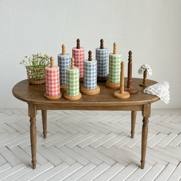 Miniature gingham paper rolls and wooden holders displayed in a 1:6 room scene