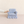 Blue striped miniature skirted armchair beside a hand for size reference