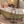 1:6 miniature green clawfoot bathtub and freestanding faucet with a 1:6 doll for scale